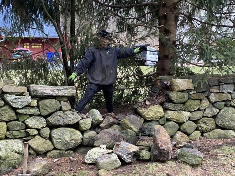 Stone fence crumbled.