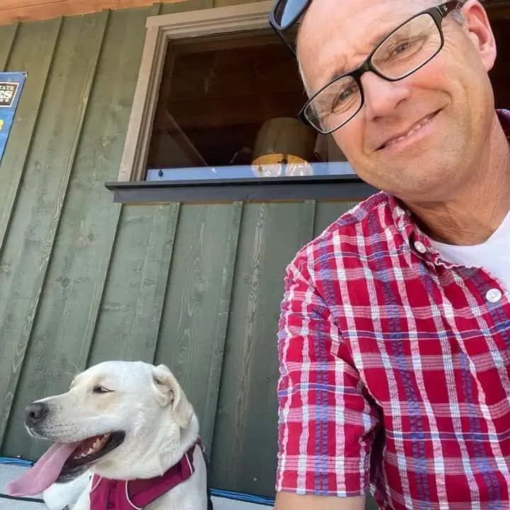 Peter Robidoux with his dog.